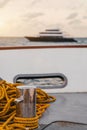 A boat bollard with a yellow rope Royalty Free Stock Photo