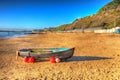 Boat on Bournemouth beach Dorset England UK like a painting HDR Royalty Free Stock Photo