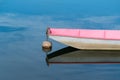 Boat bow isolated in blue water Royalty Free Stock Photo