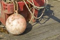 Boat buoy with rope in container