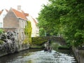 BOAT ON CANAL BRUGES, BELGIUM