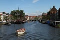 Boat in canal and City of Leiden