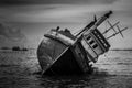 The boat capsized in the sea Royalty Free Stock Photo