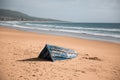 Boat carcass with Blue Paints on the Sandy Beach of Bolonia Spain with Ocean View Royalty Free Stock Photo