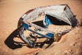 Boat carcass with Blue Paints on the Sandy Beach of Bolonia Spain with Ocean View Royalty Free Stock Photo