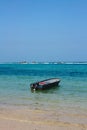 Boat in caribbean beach. Tayrona National Park. Colombia