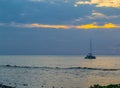 Boat on the Caribbean sea at sunset at Grand Palladium at night