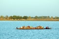 Boat carrying goods and people in Africa