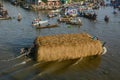 The boat carrying straw on Mekong river Royalty Free Stock Photo