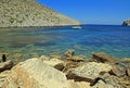 Boat in clear blue water of Cala Castell