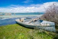 Boat on Coast of clear Sevan Lake in Armenian mountains, Armenia
