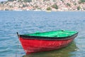 Boat with coast town in background Royalty Free Stock Photo