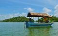 Boat with coconuts on the Madu Ganga river in Sri Lanka