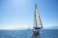 Boat competitor of sailing regatta in clear sunny weather. Royalty Free Stock Photo