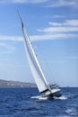 Boat competitor of sailing regatta, clear sunny weather. Royalty Free Stock Photo