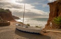 Boat in the cove sa caleta in Ibiza Royalty Free Stock Photo