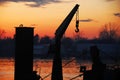 Boat cran and sunset at Sava river Royalty Free Stock Photo