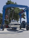 Boat on crane Royalty Free Stock Photo