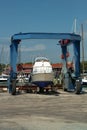 Boat on crane Royalty Free Stock Photo