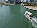 A boat cruising the Miami river