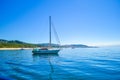 Boat diving in front of a beach of Cies Islands, in Galicia, Spa Royalty Free Stock Photo