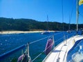 Boat diving in front of a beach of Cies Islands, in Galicia, Spa Royalty Free Stock Photo