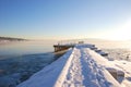 Boat dock covered with snow and ice Royalty Free Stock Photo