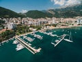 Boat dock and yacht port in Budva, Montenegro. Aerial photo from the drone. Royalty Free Stock Photo