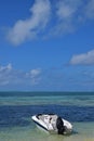 Boat docked on beach at Ile aux Cerfs Mauritius Royalty Free Stock Photo