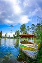 Boat docked on lakebank in the morning vacation Royalty Free Stock Photo