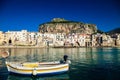 Boat drifting in a harbor of Cefalu Royalty Free Stock Photo