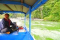 the boat and the driver are running the boat on lake Batur, Bali, Indonesia Royalty Free Stock Photo