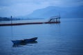 A boat at dusk in Onan Baru, Pangururan, Samosir Island, Toba Lake, North Sumatra, Indonesia.