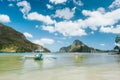 Boat in El Nido bay and Cadlao island, Palawan, Philippines Royalty Free Stock Photo