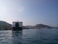 the boat explores a group of islands that lie on the island of komodo in Labuan Bajo Royalty Free Stock Photo