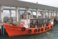 Boat at ferry pier, city transport from central island, Hongkong