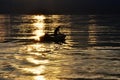 Boat and fisherman in sunset.Boat and fisherman in wonderful sunset at Adriatic sea Croatia-Kvarner