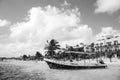 Boat with flag on tropical beach, Costa Maya, Mexico Royalty Free Stock Photo