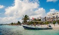 Boat with flag on tropical beach, Costa Maya, Mexico Royalty Free Stock Photo