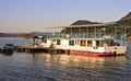 A boat floating on the Donau at dusk