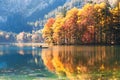 Boat floating on the lake in Austrian Alps. Royalty Free Stock Photo