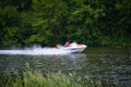 The boat floats on the river.