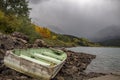 Boat and fly rod on Alpine lake near Telluride, Colorado Royalty Free Stock Photo