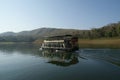 Boat on forest lake, Periyar National Park