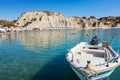 Boat in front of umbrellas, sunbeds on Kolymbia beach Rhodes, G