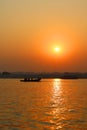 Boat at Ganges river in Varanasi, India at sunrise. Royalty Free Stock Photo