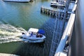 Boat going under drawbridge with ladder, Florida Royalty Free Stock Photo