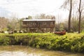 Boat on grass and wooden house in the Delta del Parana, Tigre Buenos Aires Argentina Royalty Free Stock Photo