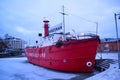 Boat in harbor in winter Helsinki Royalty Free Stock Photo