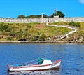 Boat On The Havana Harbor With La Cabana Fortress In Background